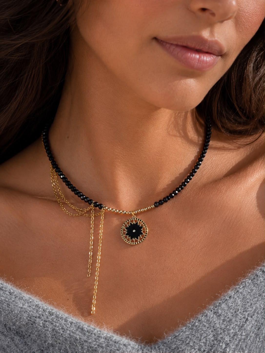 IMG-20260613-WA0082 COLLIER SOLEIL NOIR – Image 1